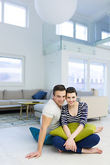 Image showing couple sitting on the floor at home