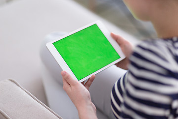 Image showing woman on sofa using tablet computer