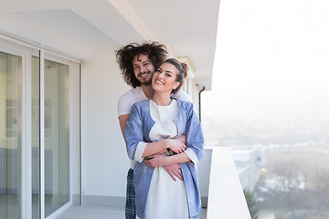 Image showing Couple hugging on the balcony