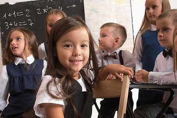 Image showing School children in classroom at lesson