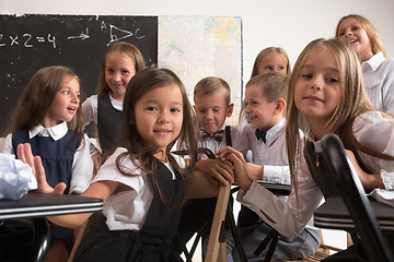 Image showing School children in classroom at lesson