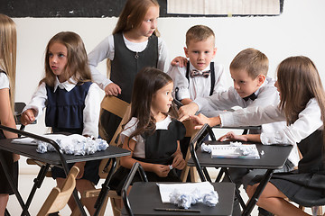 Image showing School children in classroom at lesson