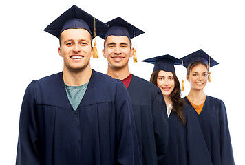 Image showing graduates in mortar boards and bachelor gowns