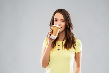 Image showing young woman or teenage girl drinking coffee