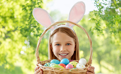 Image showing happy girl with colored easter eggs