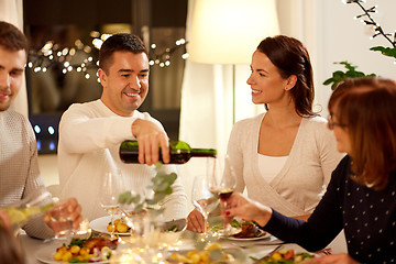 Image showing happy family having dinner party at home