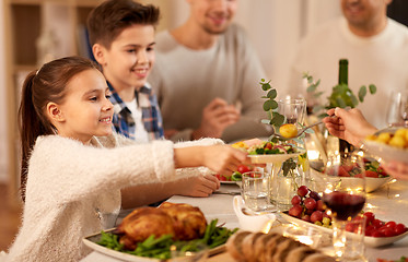 Image showing happy family having dinner party at home