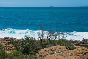 Image showing Beautiful azure sea and the rocky beach