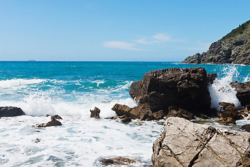 Image showing Beautiful azure sea and the rocky beach