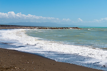 Image showing Beautiful sea and the black sandy beach,