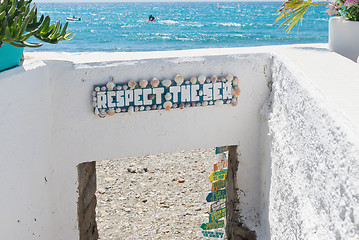 Image showing The sign with text and beautiful azure sea