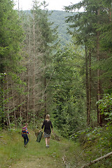Image showing Mother and son in the forest