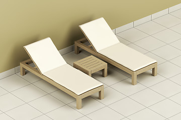 Image showing Wooden sun loungers and table