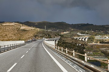 Image showing Highway in hilly landscape