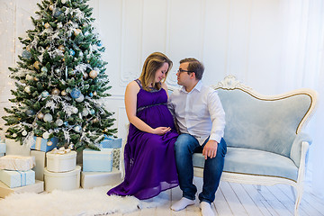 Image showing Family portrait near christmas tree