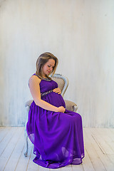 Image showing Beautiful pregnant woman sitting