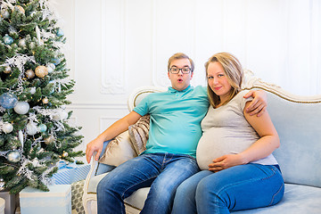 Image showing Family portrait near christmas tree