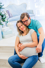 Image showing Family portrait near christmas tree