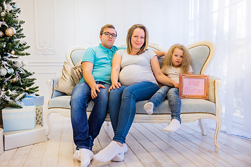 Image showing Family portrait near christmas tree