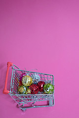 Image showing Christmas toys in shopping trolley