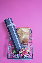 Image showing Christmas toys in shopping basket