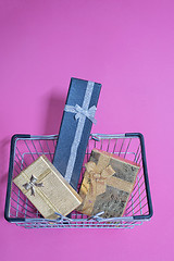 Image showing Christmas toys in shopping basket