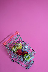 Image showing Christmas toys in shopping trolley