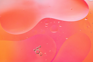 Image showing Red and orange abstract background picture made with oil, water and soap