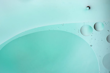 Image showing Light blue abstract background picture made with oil, water and soap