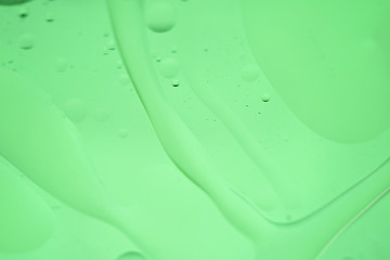 Image showing Green mint abstract background picture made with oil, water and soap