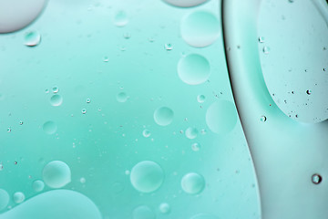Image showing Light blue abstract background picture made with oil, water and soap