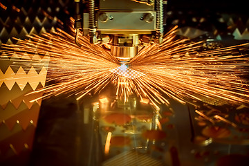 Image showing CNC Laser cutting of metal, modern industrial technology.