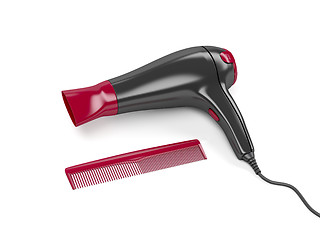 Image showing Hair dryer and comb