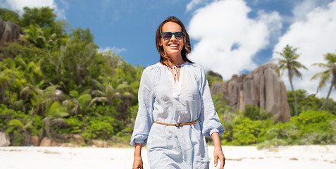 Image showing happy woman over seychelles island tropical beach