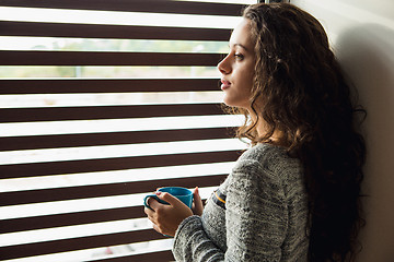 Image showing Thoughtful young girl