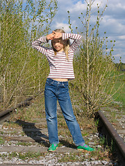 Image showing Girl  on the railroad