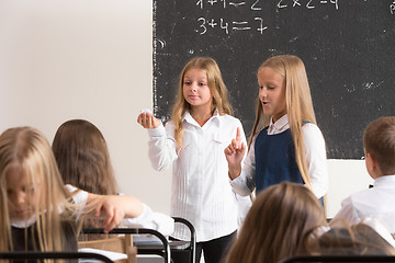 Image showing School children in classroom at lesson