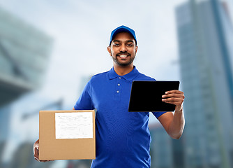 Image showing indian delivery man with tablet pc and parcel box