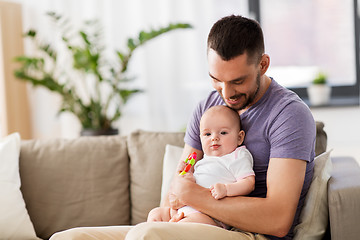 Image showing happy father with little baby daughter at home