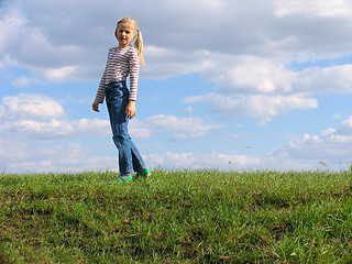 Image showing Young girl on grass