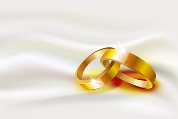 Image showing Two wedding rings on silk background