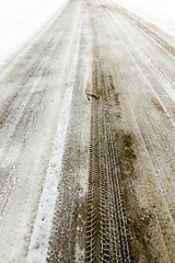 Image showing traces of the car on snow