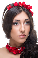 Image showing beautiful girl with red ribbon accessories