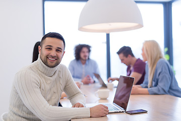 Image showing Startup Business Team At A Meeting at modern office building