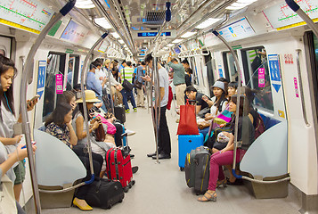 Image showing People inside metro train. Singapore