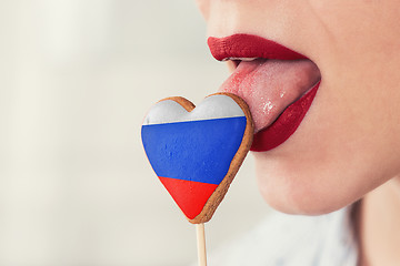 Image showing Lips and cookie with flag