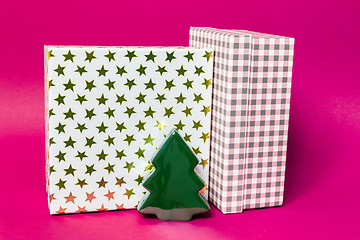 Image showing Christmas decoration gift box with pink background