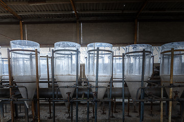 Image showing Abandoned industrial interior with breeding tanks