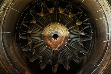 Image showing Rusty old jet engine closeup as background