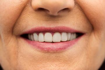 Image showing close up of senior woman smiling mouth and teeth